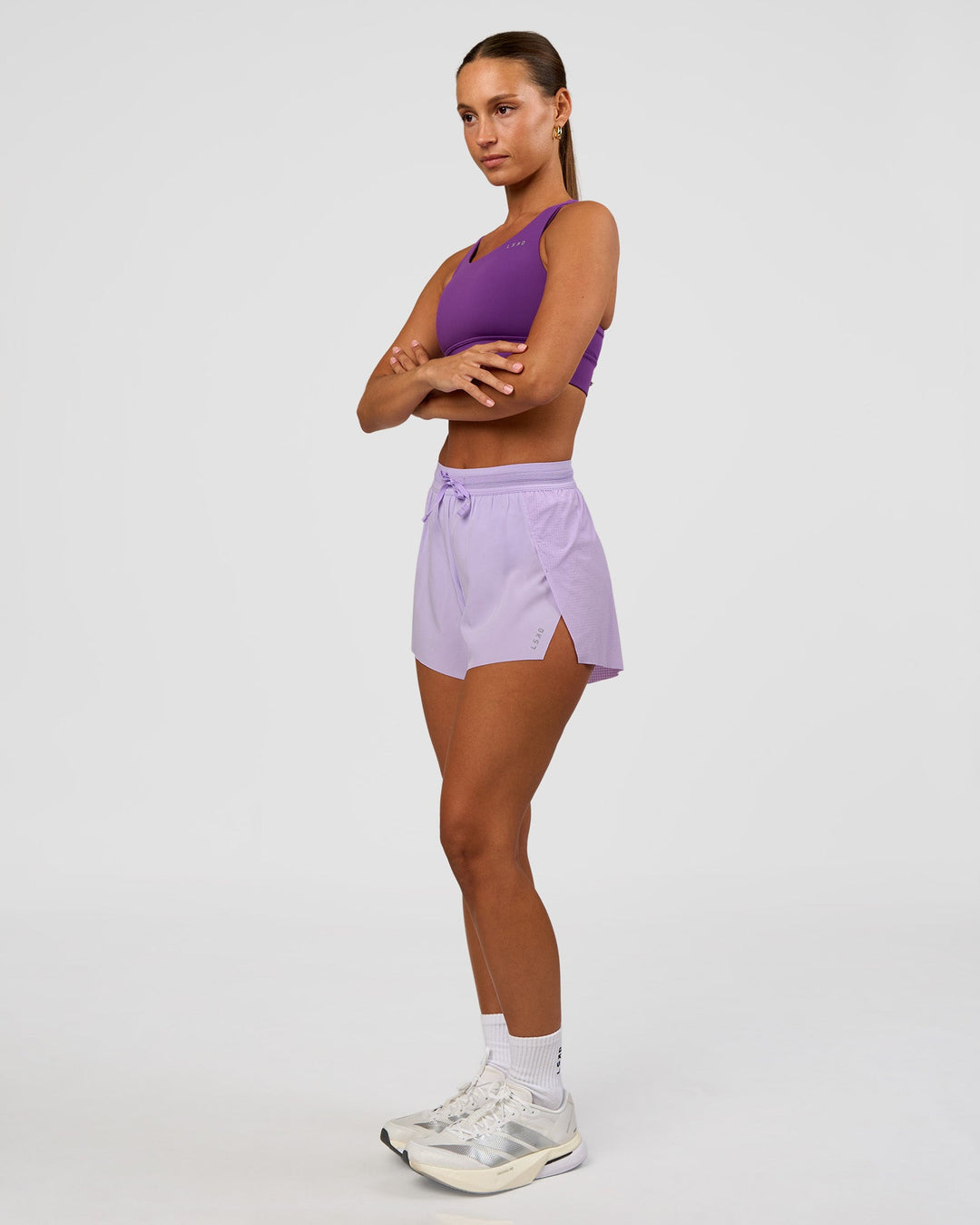 Woman wearing Accelerate Sports Bra - Fresh Purple | Model:Brylee | Size:XS