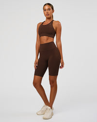 Woman wearing Accelerate Sports Bra - Hot Chocolate | Model:Charli | Size:XS | Thumbnail Index: 4