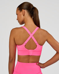 Woman wearing Accelerate Sports Bra - Sugar Plum | Set:true | Angle:back | Model:Brylee | Size:XS | Thumbnail Index: 5