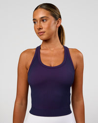 Woman wearing Activate Seamless Ribbed Shelf Bra Tank - Future Navy-Ultra Fuchsia | Model:Charli | Size:XS