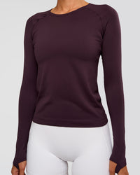 Woman wearing AeroFLX+ Seamless Long Sleeve Tee - Midnight Plum/Midnight Plum | Model:Charli | Size:XS