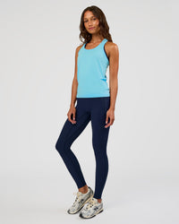 Woman wearing AeroFLX+ Seamless Tank - Baltic Sea/Baltic Sea | Model:Dakota | Size:XS