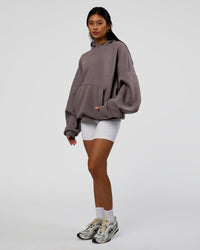 Woman wearing AfterDark ZeroCrease Oversized Hoodie - Duskstone | Model:Loren | Size:XS