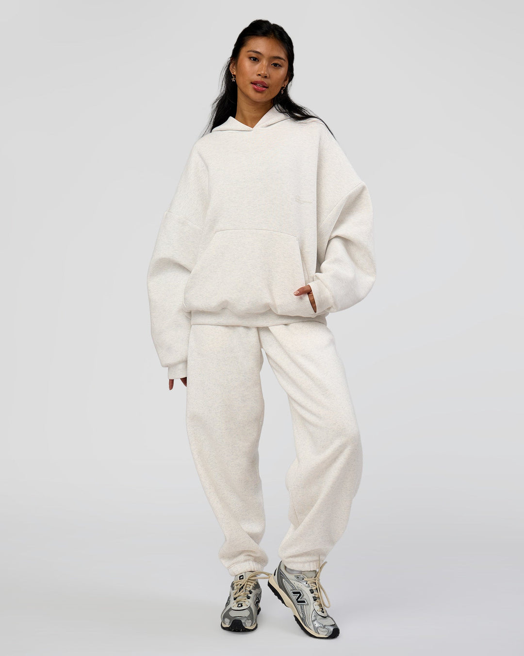 Woman wearing AfterDark ZeroCrease Oversized Hoodie - Silver Marl | Model:Loren |Size:XS - view 12