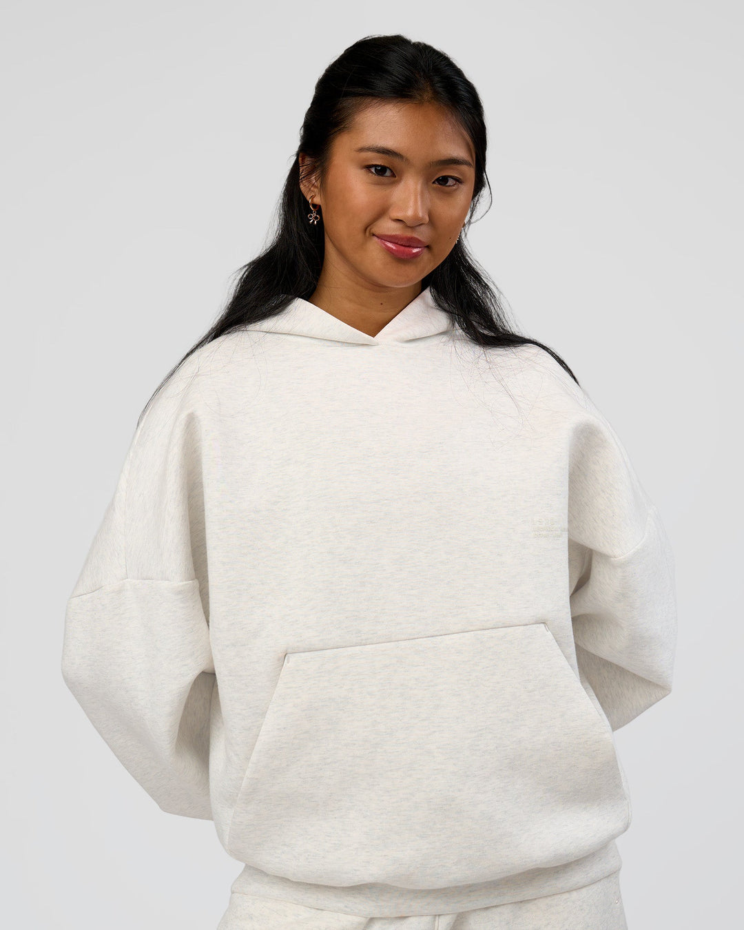 Woman wearing AfterDark ZeroCrease Oversized Hoodie - Silver Marl | Model:Loren |Size:XS - view 6