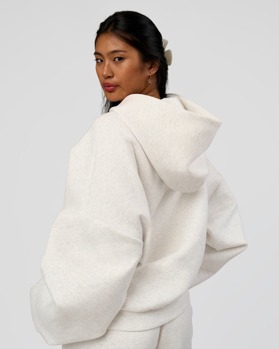 Woman wearing AfterDark ZeroCrease Oversized Hoodie - Silver Marl | Model:Loren |Size:XS - view 3