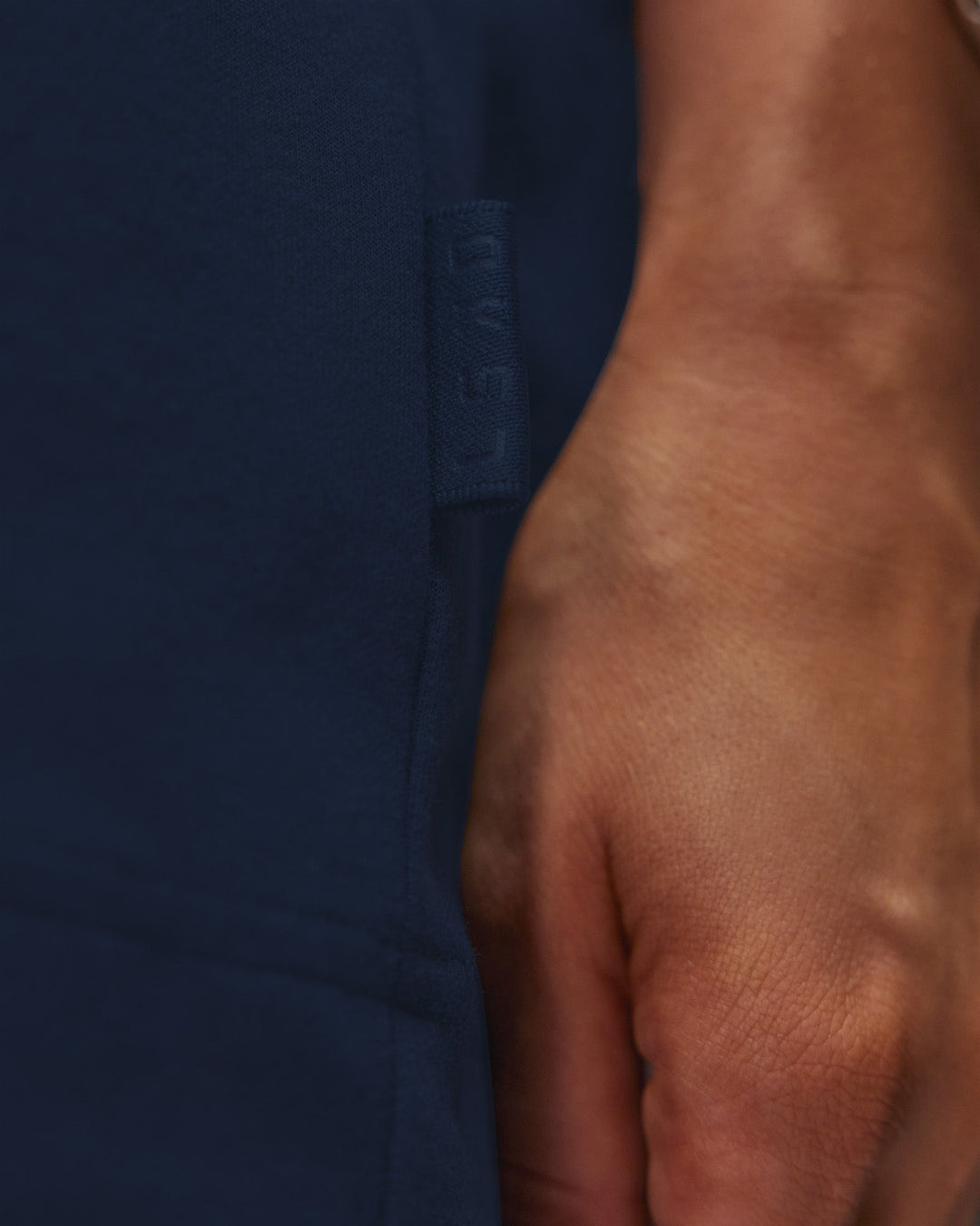 Woman wearing AfterDark ZeroCrease Oversized Tee - Future Navy | Model:Leilani | Size:XS