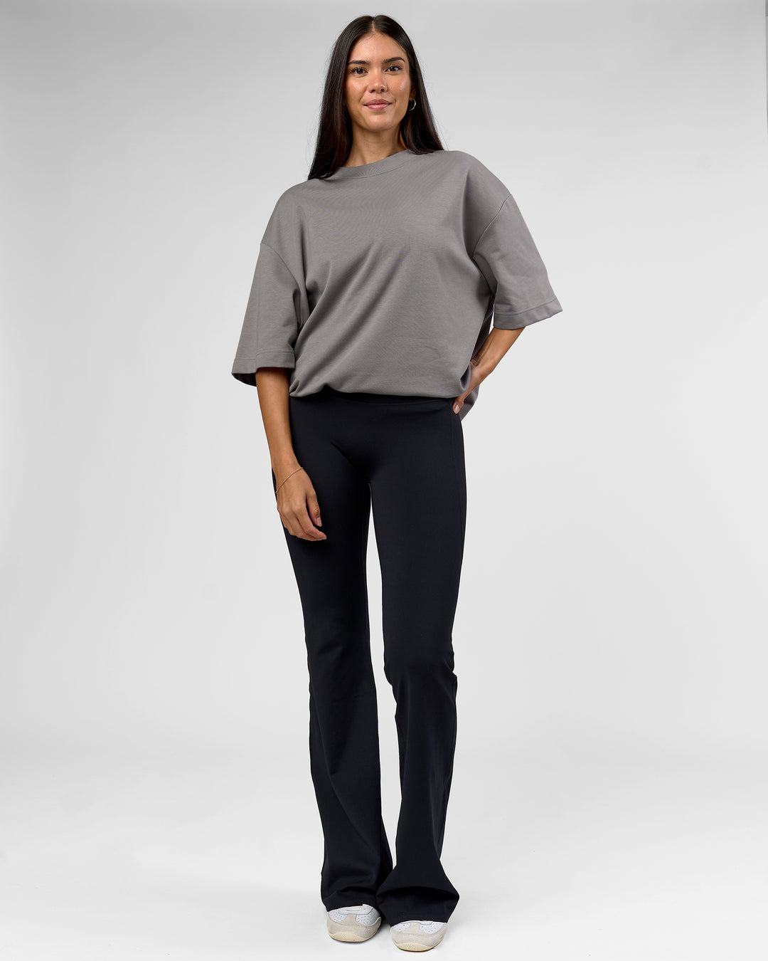 Woman wearing AfterDark ZeroCrease Oversized Tee - Storm Front | Model:Rhylee | Size:XS