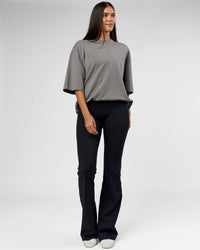 Woman wearing AfterDark ZeroCrease Oversized Tee - Storm Front | Model:Rhylee | Size:XS