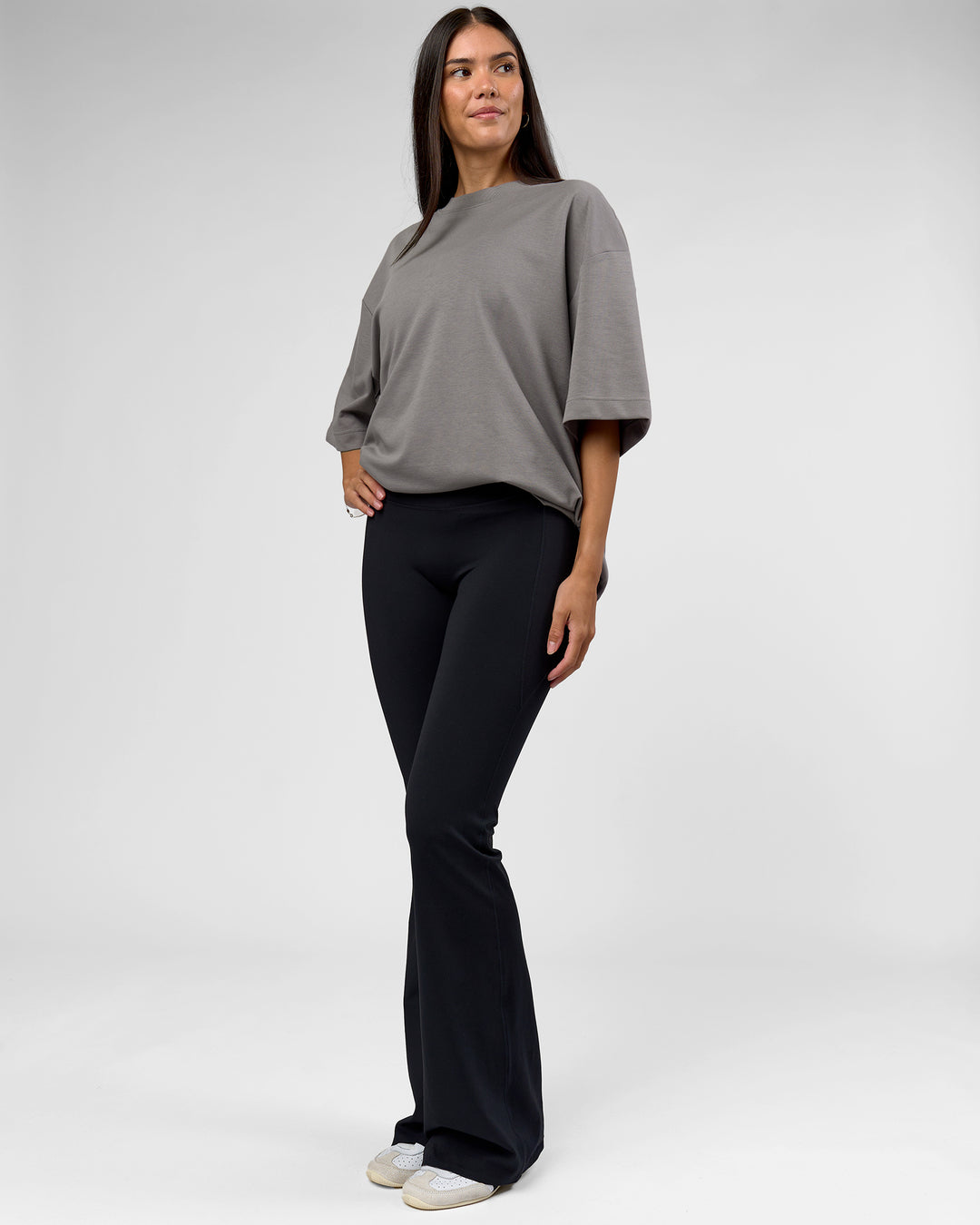 Woman wearing AfterDark ZeroCrease Oversized Tee - Storm Front | Model:Rhylee | Size:XS
