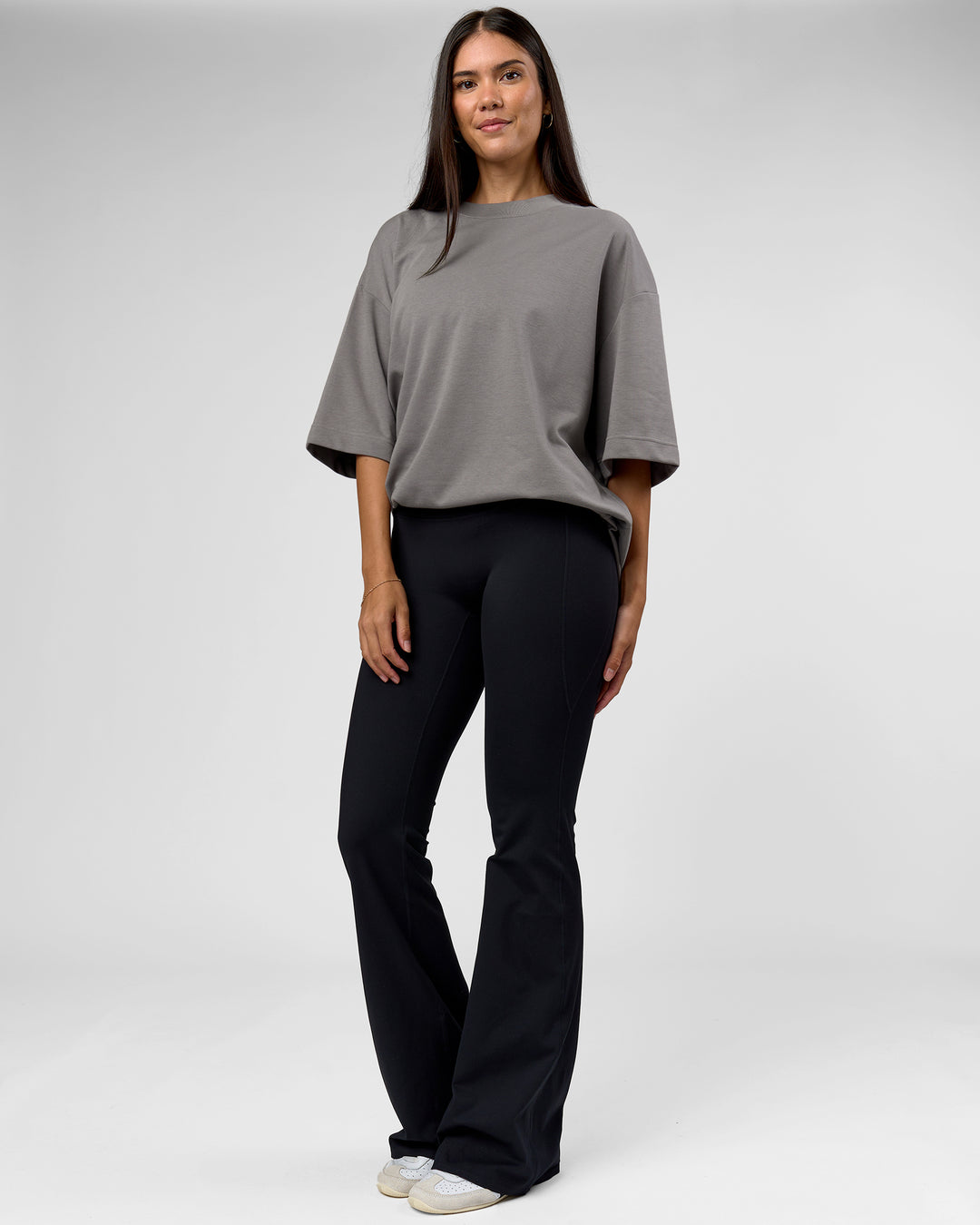 Woman wearing AfterDark ZeroCrease Oversized Tee - Storm Front | Model:Rhylee | Size:XS