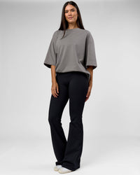 Woman wearing AfterDark ZeroCrease Oversized Tee - Storm Front | Model:Rhylee | Size:XS