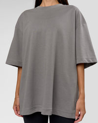 Woman wearing AfterDark ZeroCrease Oversized Tee - Storm Front | Model:Rhylee | Size:XS