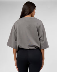 Woman wearing AfterDark ZeroCrease Oversized Tee - Storm Front | Model:Rhylee | Size:XS
