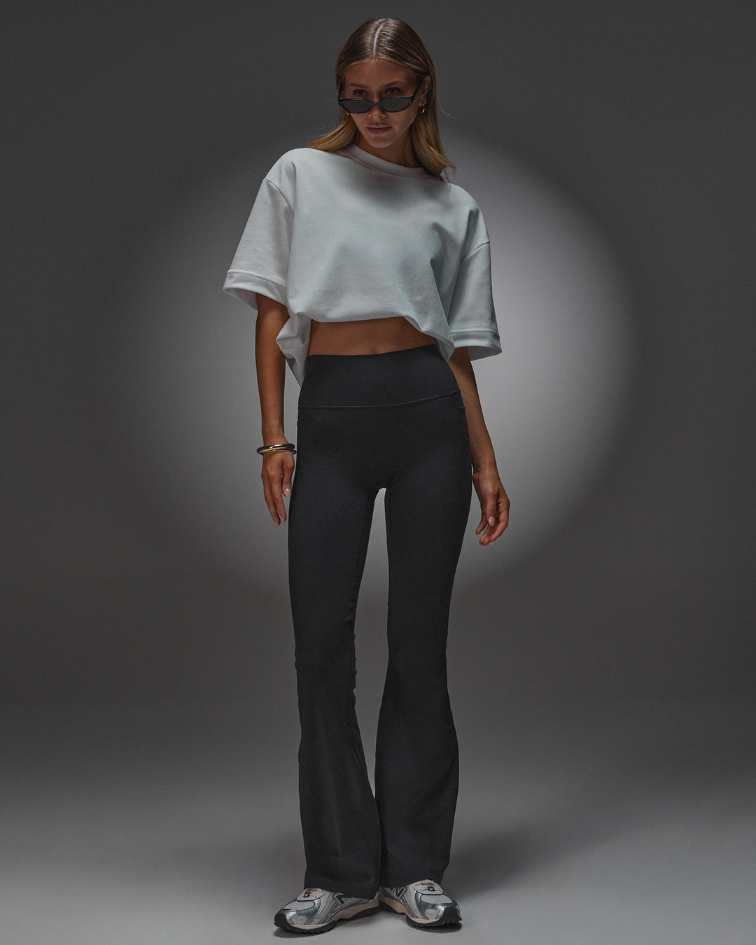 Woman wearing AfterDark ZeroCrease Oversized Tee - White | Model:Leilani | Size:XS