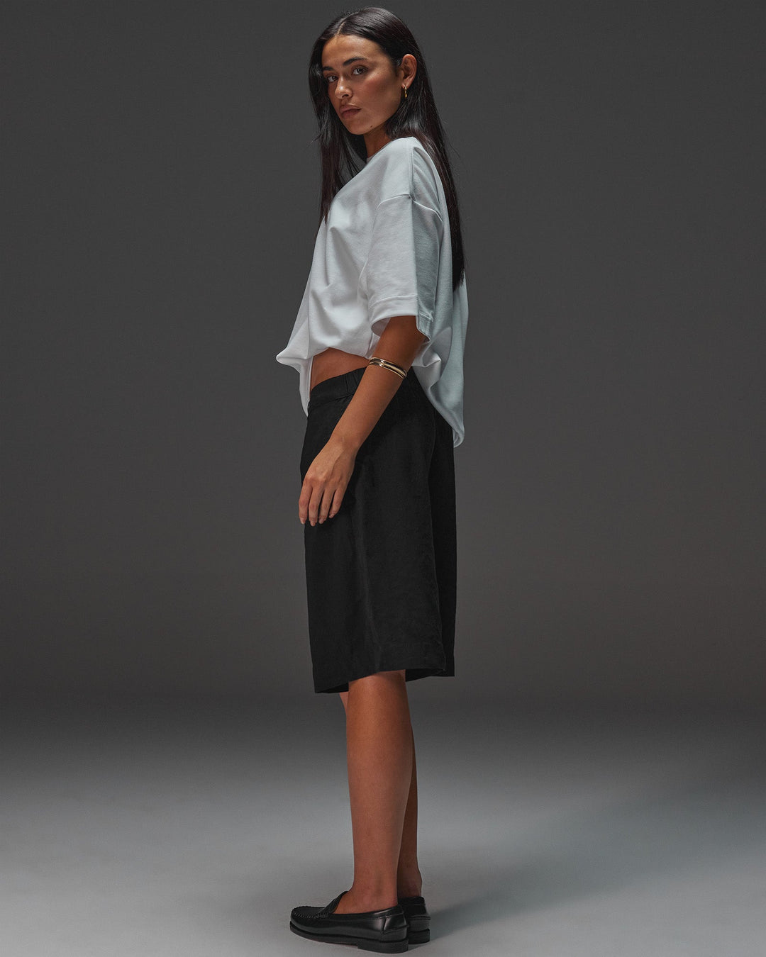 Woman wearing AfterDark ZeroCrease Oversized Tee - White | Model:Ruby | Size:XS