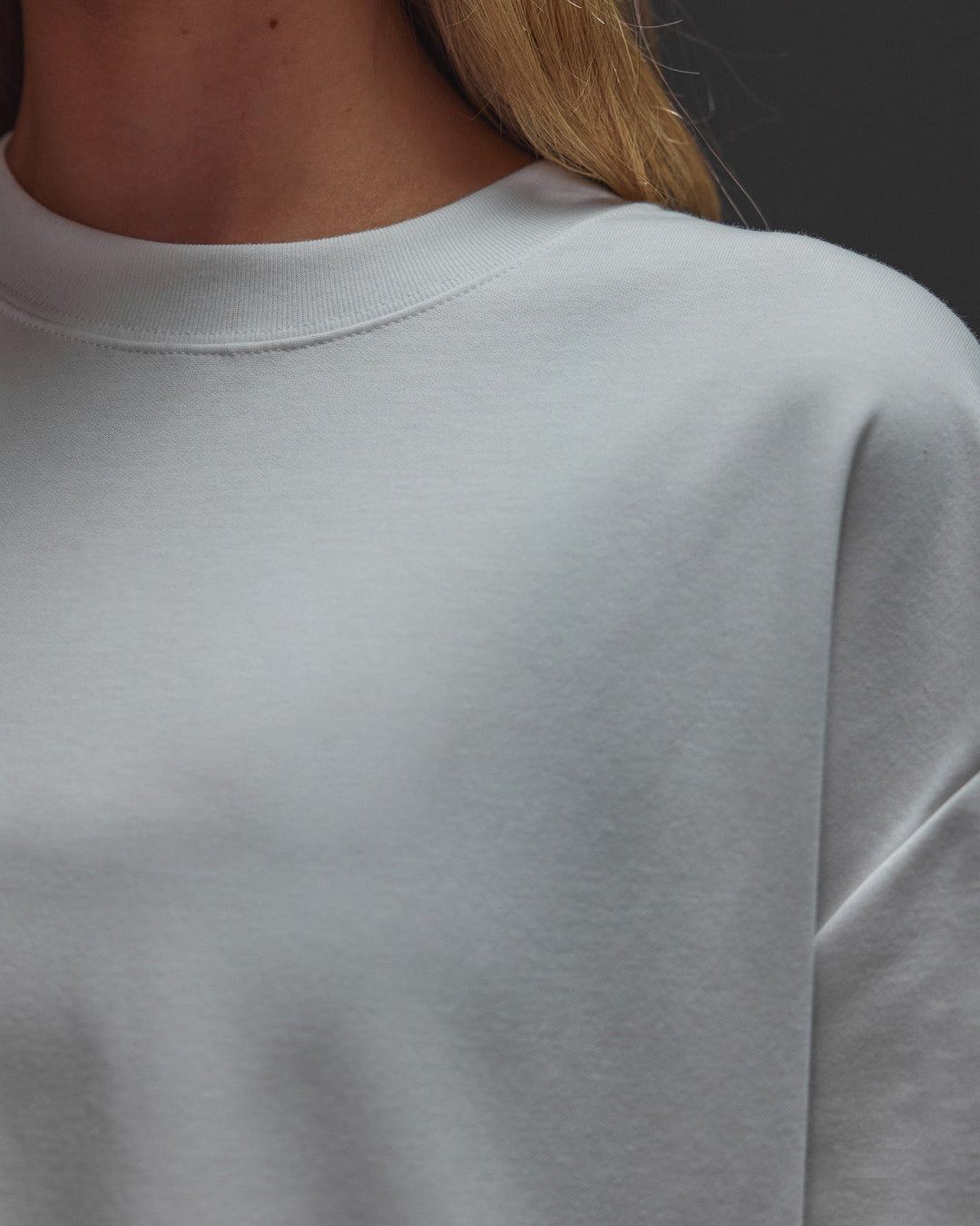 Woman wearing AfterDark ZeroCrease Oversized Tee - White | Model:Leilani | Size:XS