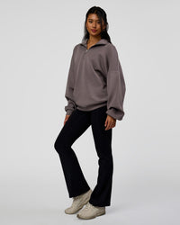 Woman wearing AfterDark ZeroCrease Quarter Zip - Duskstone | Model:Loren | Size:XS