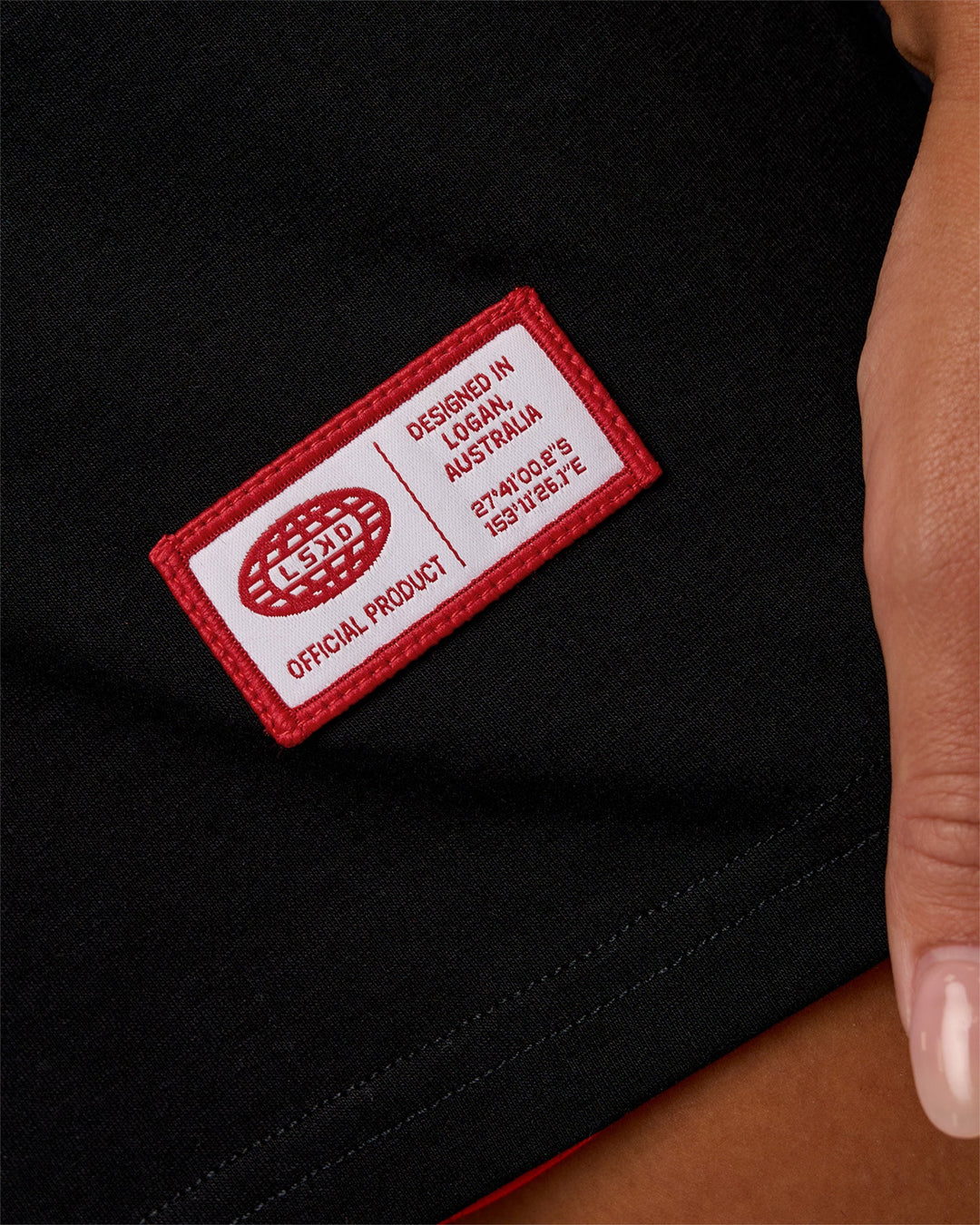 Woman wearing Archive FLXCotton Oversized Tee - Black-Scarlet | Model:Kirstyn | Size:XS