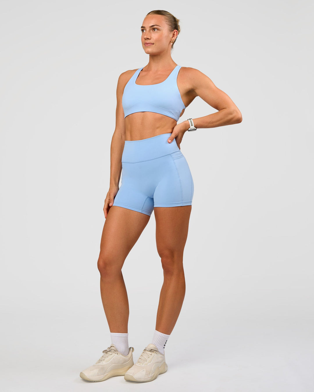 Woman wearing Aspire Sports Bra - Open Air | Model:Maja | Size:XS