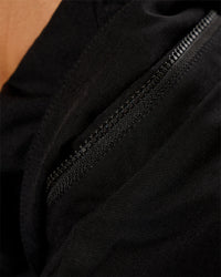 Woman wearing Auxiliary 2.0 Jacket - Black | Model:Brylee | Size:XS