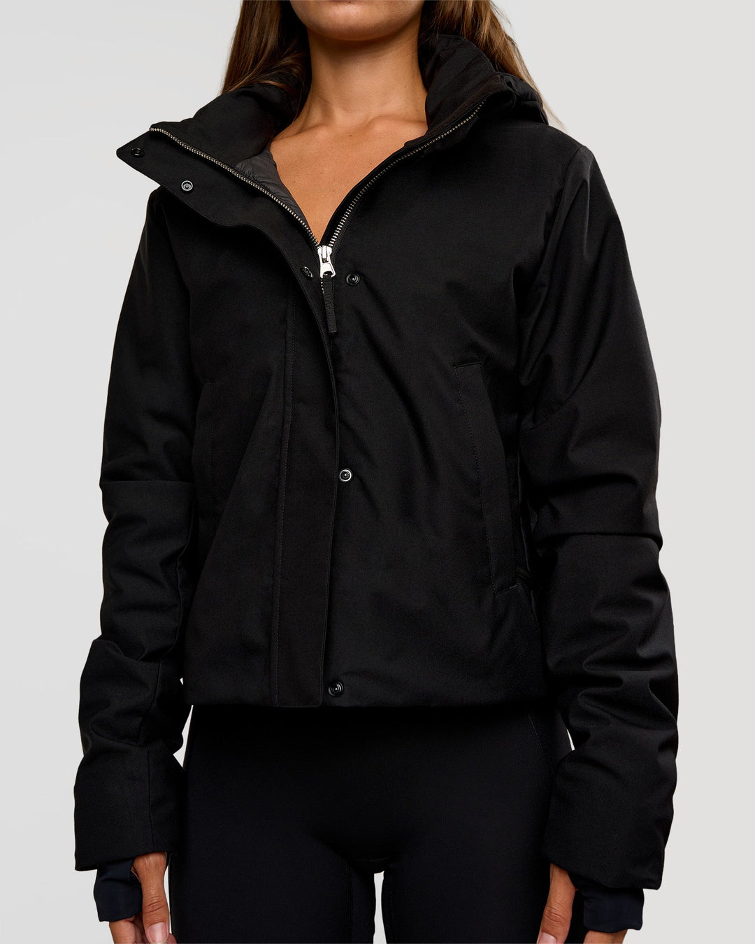 Woman wearing Auxiliary 2.0 Jacket - Black | Model:Brylee | Size:XS