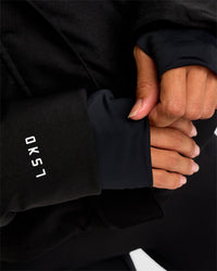 Woman wearing Auxiliary 2.0 Jacket - Black | Model:Brylee | Size:XS