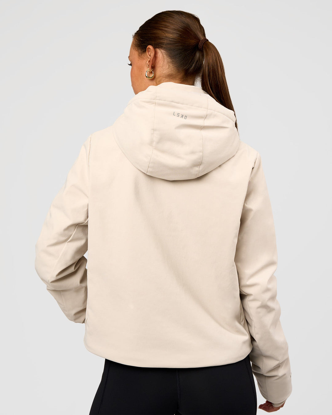 Woman wearing Auxiliary 2.0 Jacket - Shale Beige | Model:Brylee | Size:XS