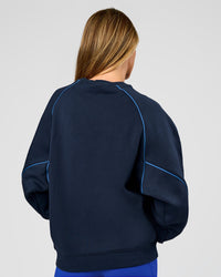 Woman wearing Axis Boxy Crew Sweater - Future Navy-Palace Blue | Model:Georgia | Size:XS