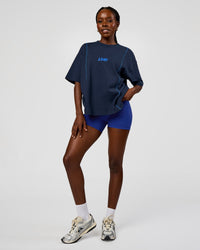 Woman wearing Axis Heavyweight Oversized Boxed Tee - Future Navy-Palace Blue | Model:Ellie | Size:XS