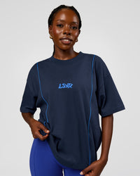 Woman wearing Axis Heavyweight Oversized Boxed Tee - Future Navy-Palace Blue | Model:Ellie | Size:XS