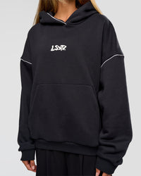 Woman wearing Axis Oversized Hoodie - Caviar-White | Model:Georgia | Size:XS
