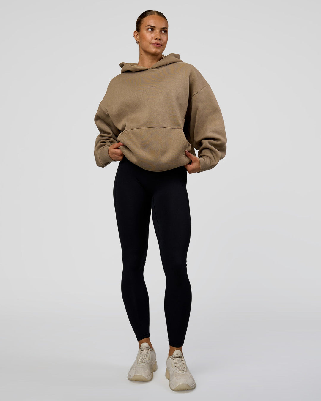 Woman wearing Base Oversized Hoodie - Taupe Ash | Model:Maja | Size:XS