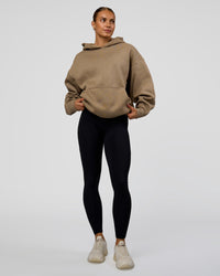Woman wearing Base Oversized Hoodie - Taupe Ash | Model:Maja | Size:XS