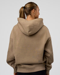 Woman wearing Base Oversized Hoodie - Taupe Ash | Model:Maja | Size:XS