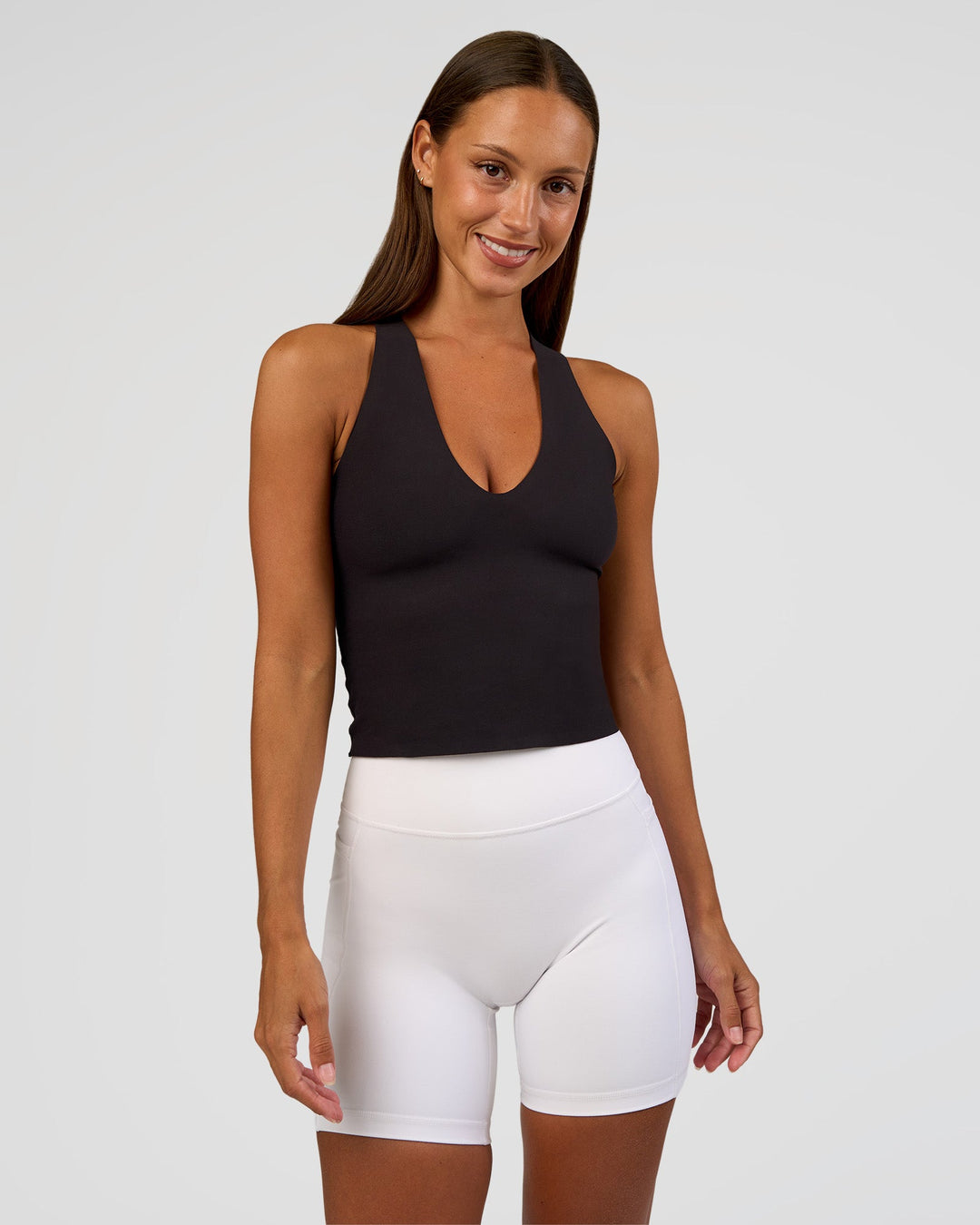 Woman wearing Bend &amp; FLX Plunge Tank - Black | Model:Brylee | Size:XS