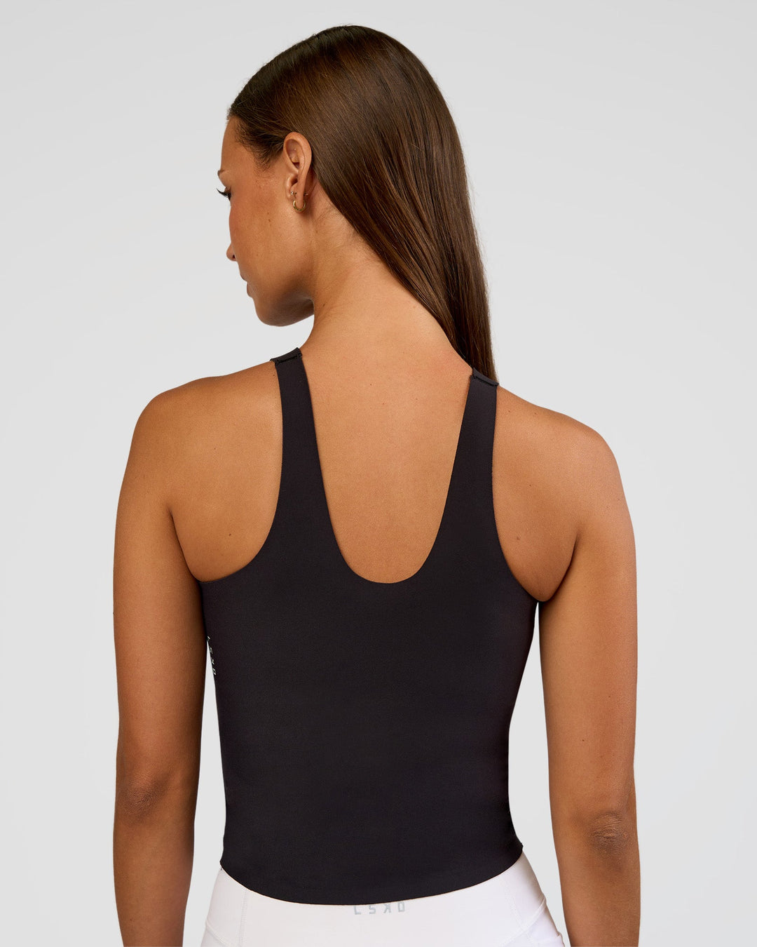 Woman wearing Bend &amp; FLX Plunge Tank - Black | Model:Brylee | Size:XS