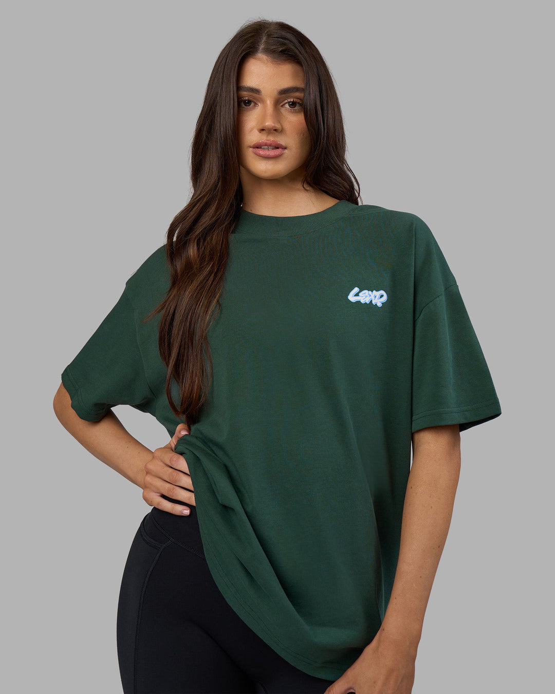 Woman wearing Break Through Heavyweight Oversized Tee - Vital Green-Open Air | Model:Phoebe | Size:XS