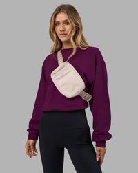 Woman wearing Breeze Open Back Sweater - Plum Caspia-Plum Caspia | Model:Leilani | Size:XS