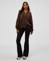 Woman wearing CF Elevate SoftTouch Bomber - Hot Chocolate | Model:Jordan | Size:XS