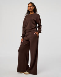 Woman wearing CF Elevate SoftTouch Pintuck Sweater - Hot Chocolate | Model:Jordan | Size:XS