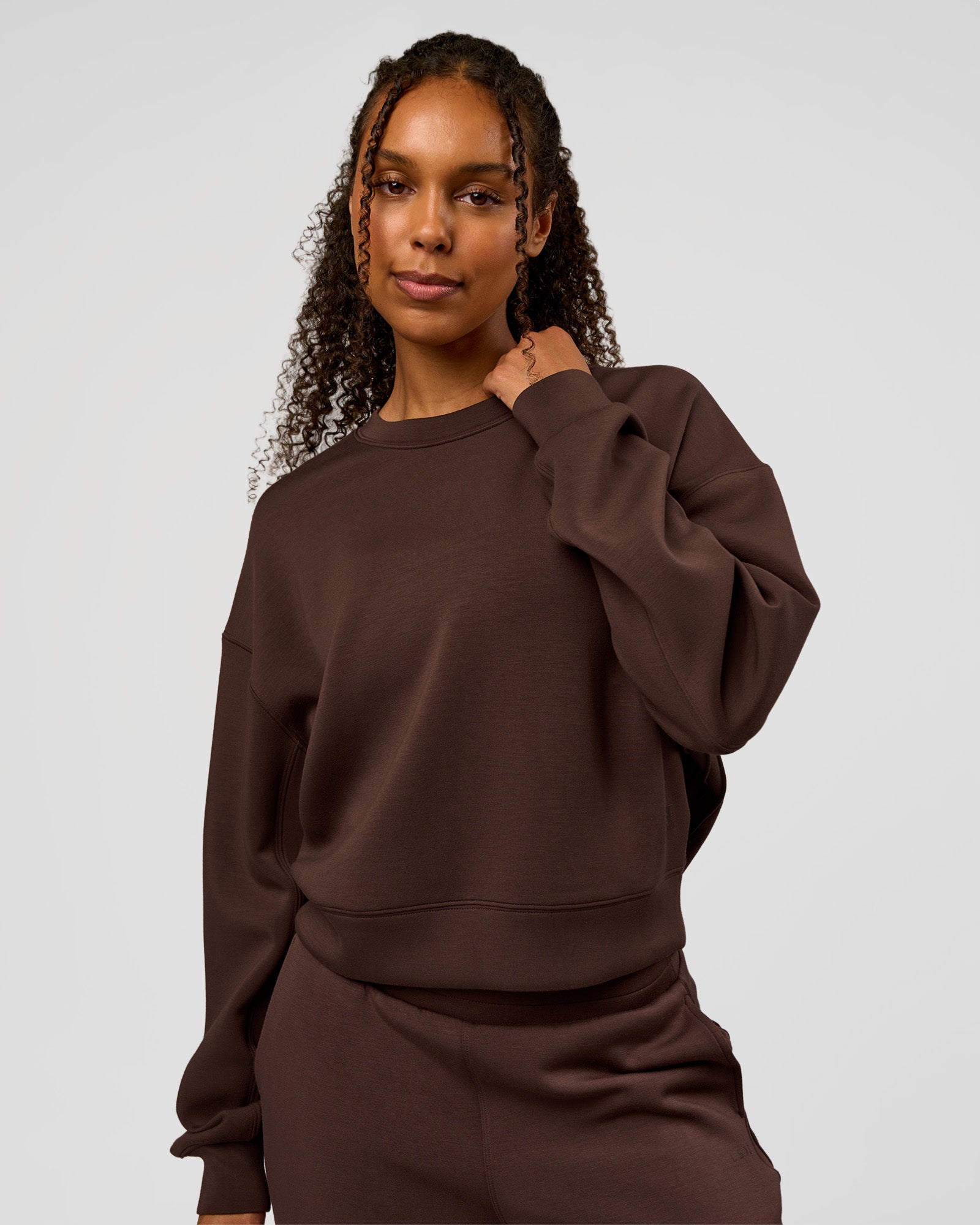 Woman wearing CF Elevate SoftTouch Pintuck Sweater - Hot Chocolate | Model:Jordan | Size:XS
