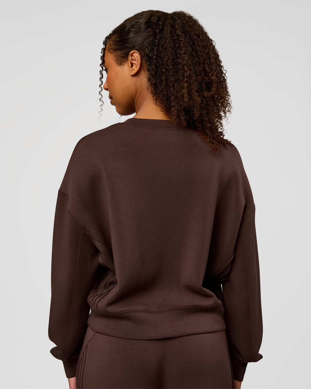Woman wearing CF Elevate SoftTouch Pintuck Sweater - Hot Chocolate | Model:Jordan | Size:XS