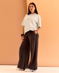 Woman wearing CF Elevate SoftTouch Pintuck Wide Leg Pant - Hot Chocolate | Model:Chloe | Size:XS 