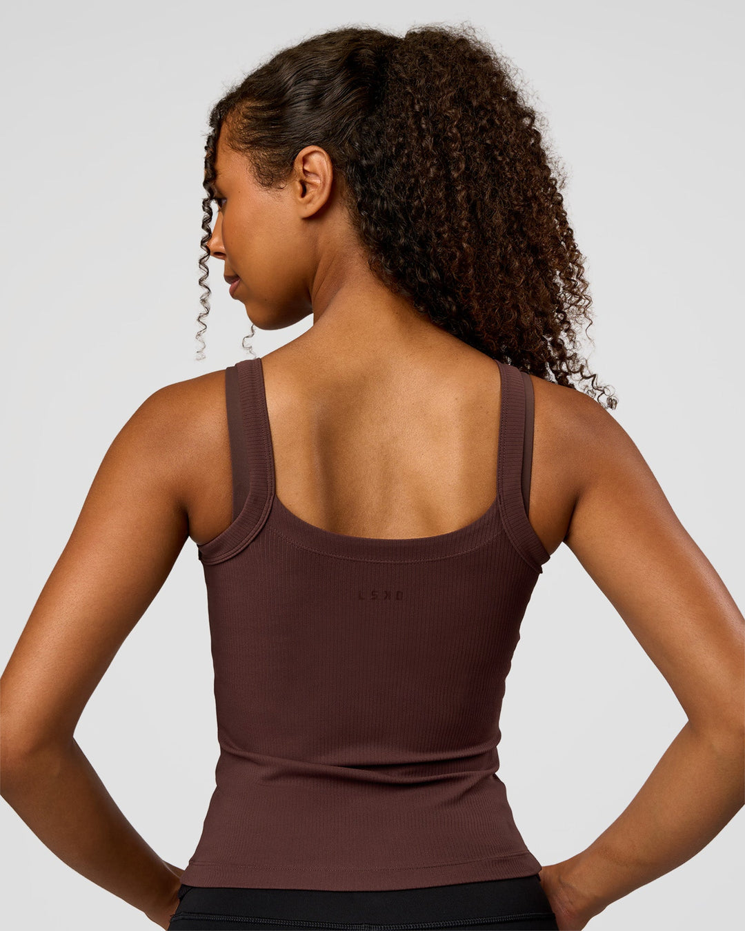 Woman wearing CF Move Through It Rib Tank - Hot Chocolate | Model:Jordan | Size:XS