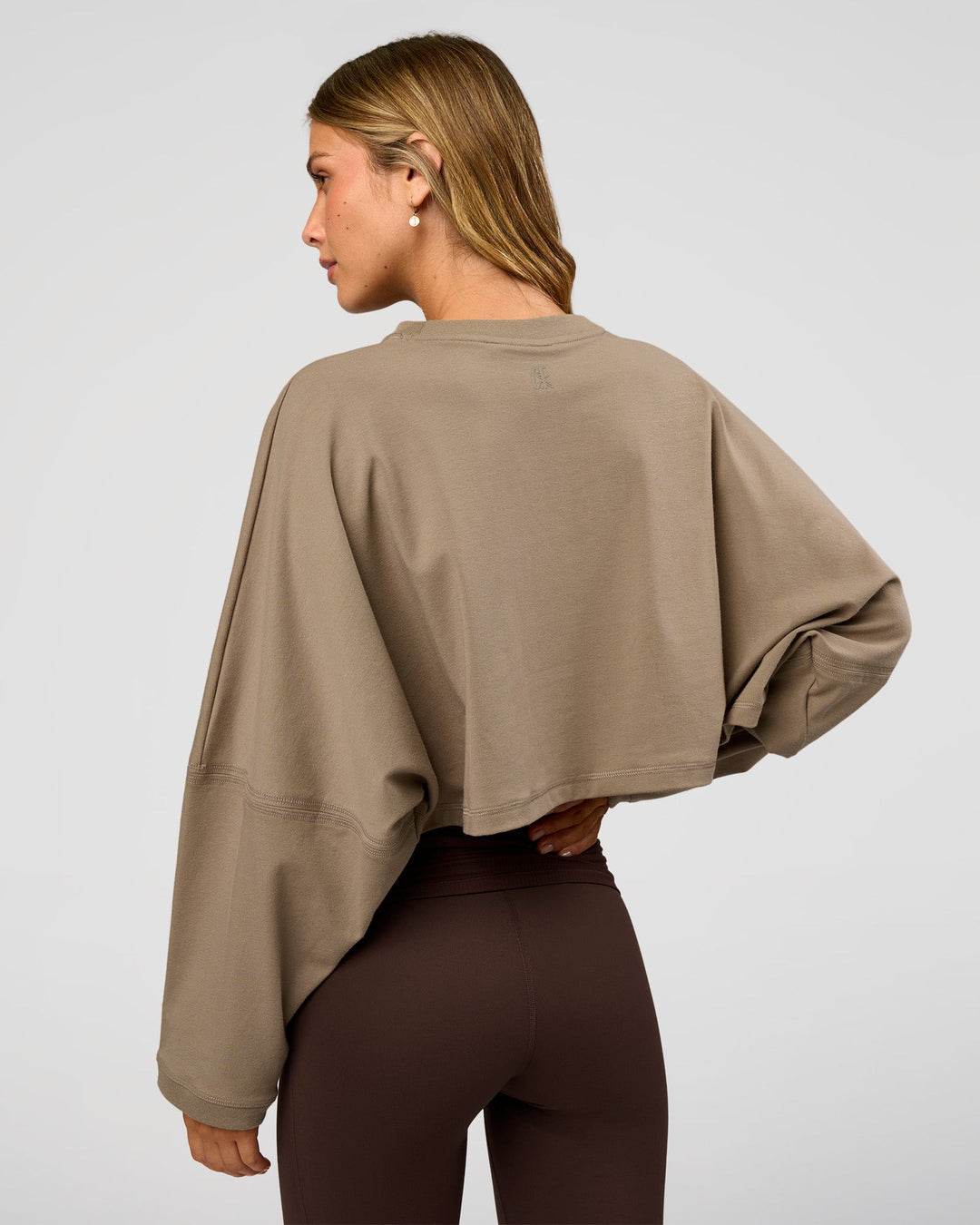 Woman wearing CF Street Surge Long Sleeve Tee - Taupe Ash | Model:Leilani | Size:XS