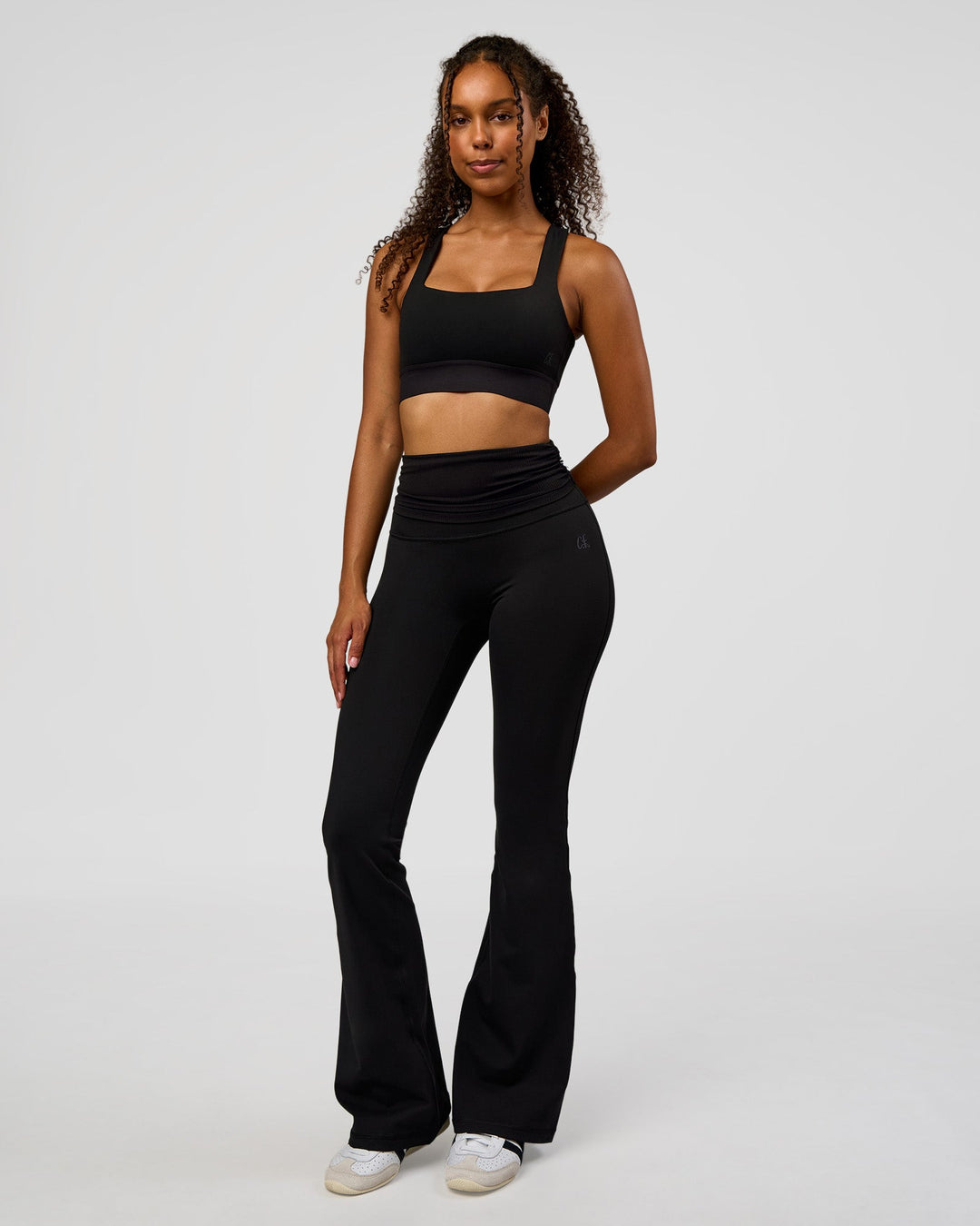 Woman wearing CF Train Hard Sports Bra - Black | Model:Jordan | Size:XS