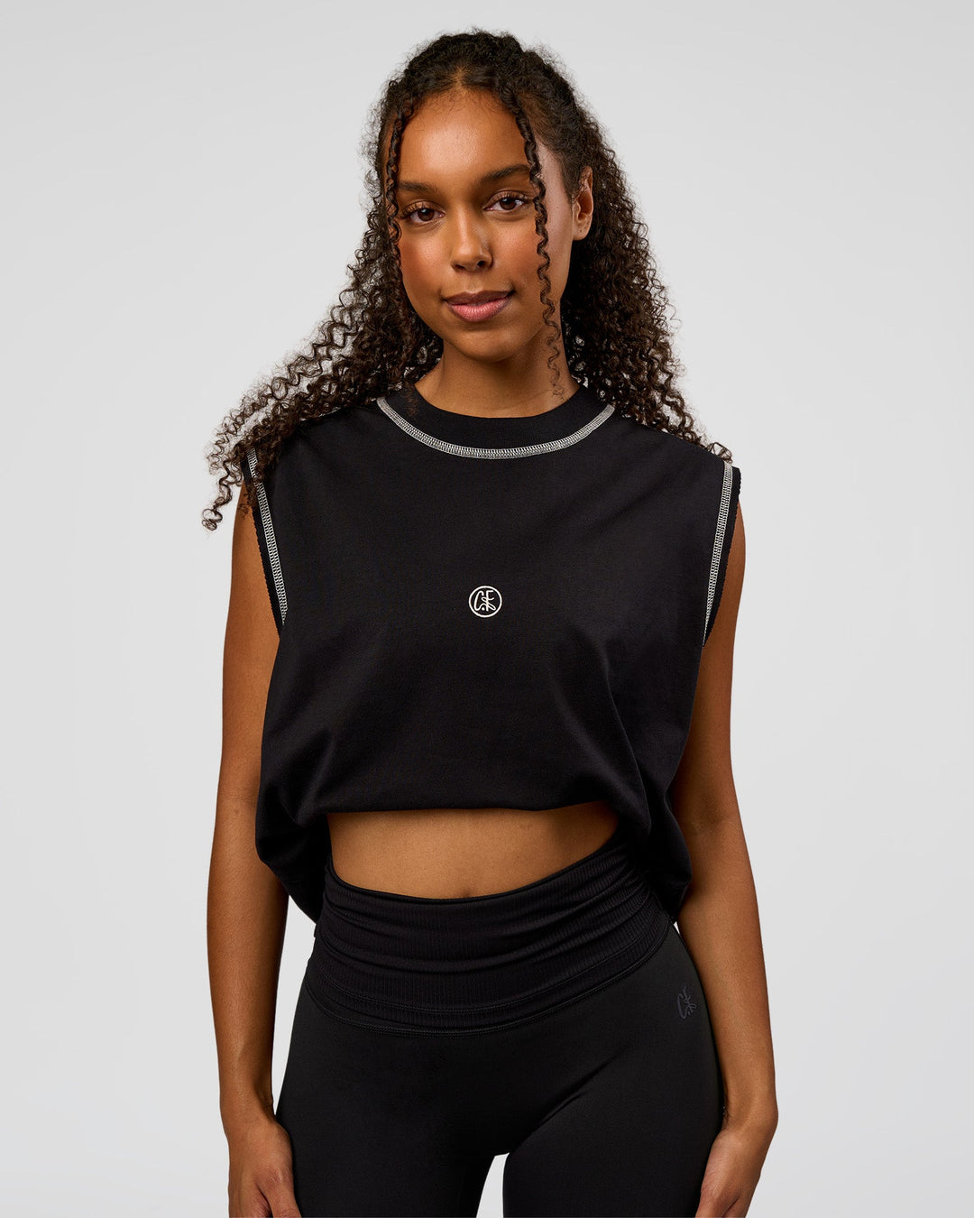 Woman wearing CF Unisex Oversized Heavyweight Boxed Tank - Black-CF X LSKD Sport | Model:Jordan | Size:XS