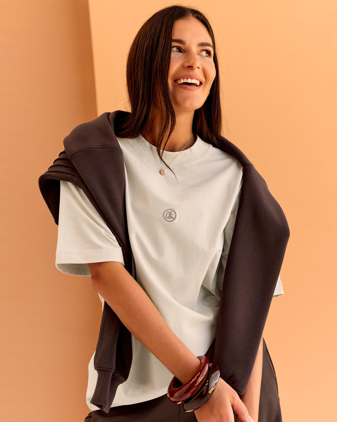 Woman wearing CF Unisex Oversized Heavyweight FLXCotton Tee - Clay-CF X LSKD Sport | Model:Chloe | Size:XS