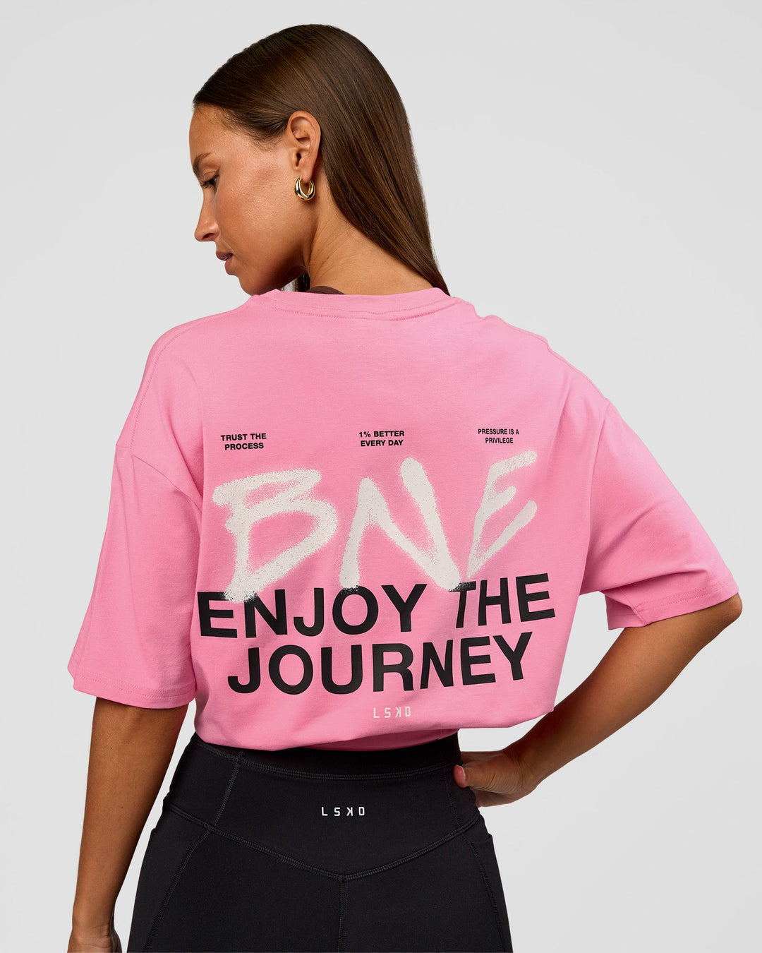 Woman wearing CFT BNE 26 FLXCotton Oversized Tee in Candy Pink | Model:Brylee | Size:XS